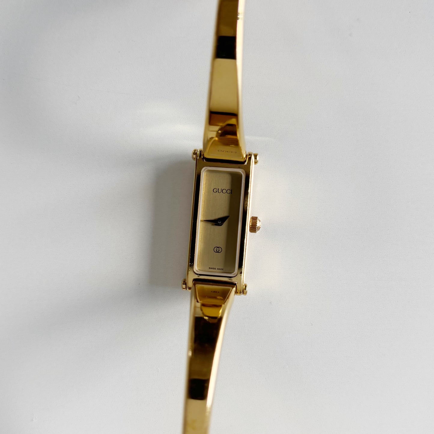 Gucci 1990s Gold Rectangular Dial Gold Plated Bangle Watch