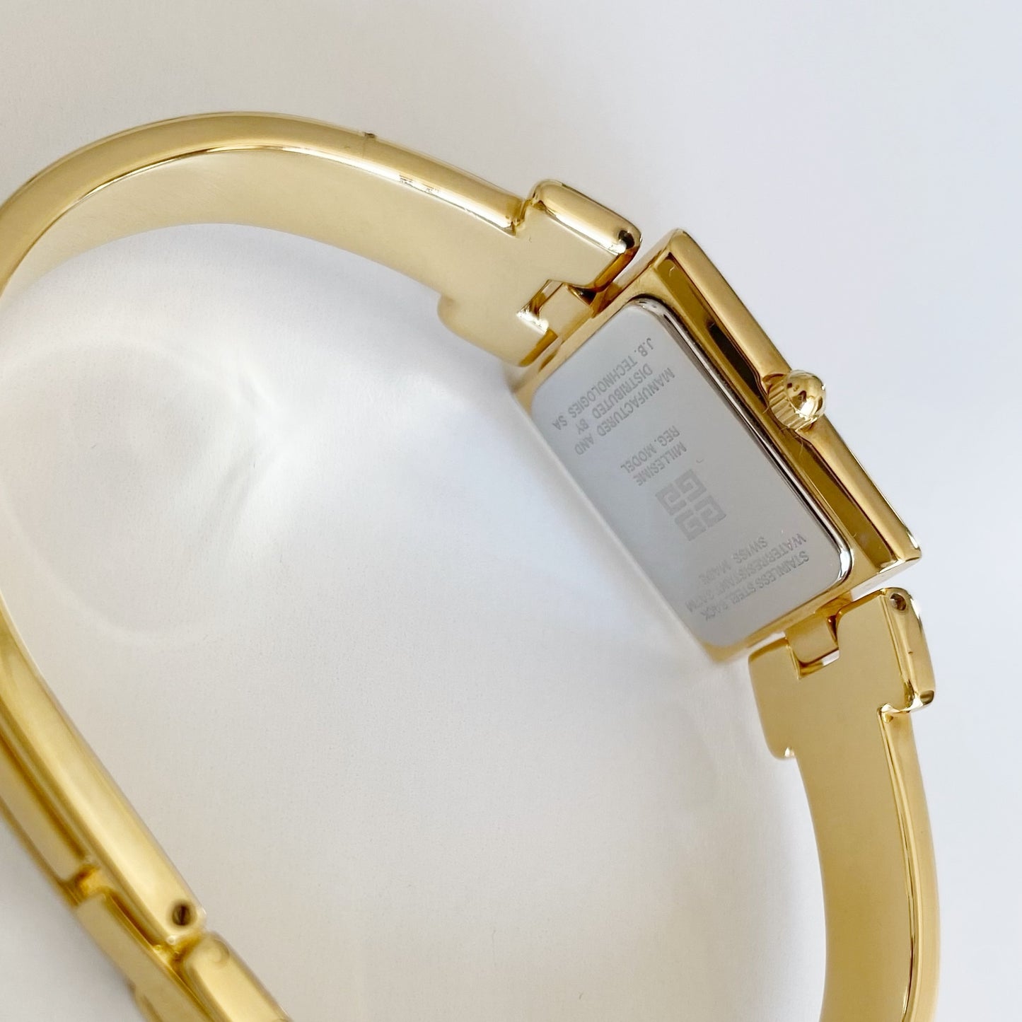 Givenchy 1990s Navy Dial Gold Plated Bangle Watch