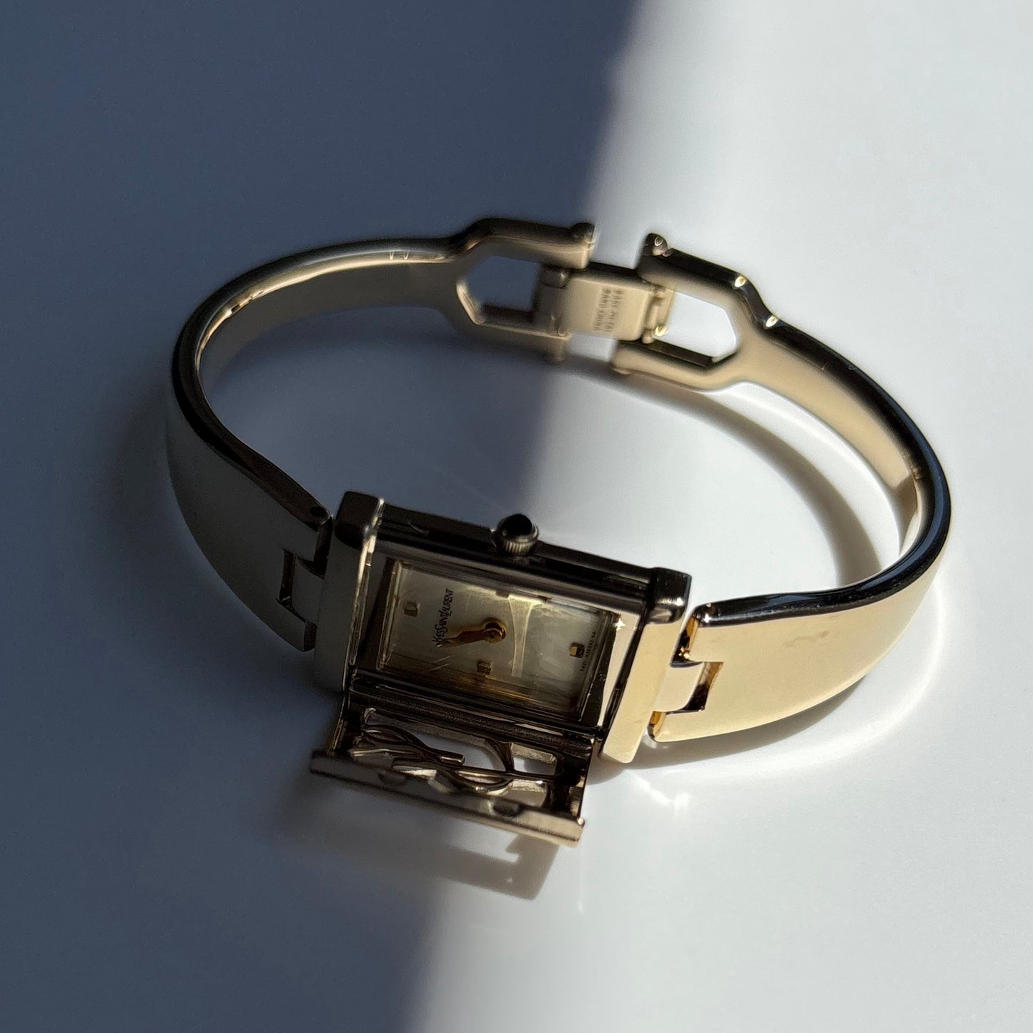 Yves Saint Laurent 1990s Peek-A-Boo Gold Plated Bangle Watch