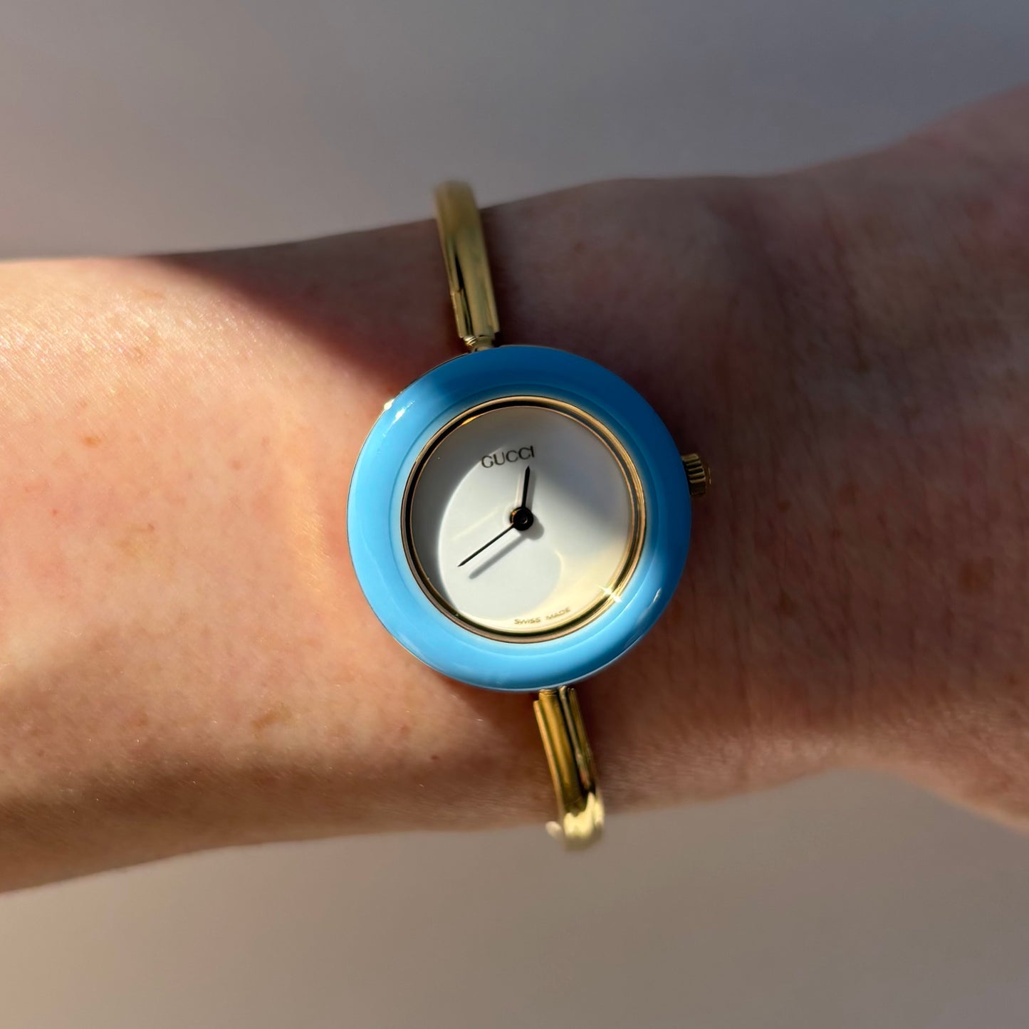 Gucci 1990s Interchangeable Bezel Gold Plated Bangle Watch with 12 bezels, case