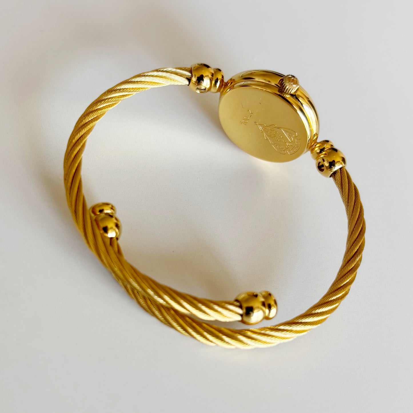 Gucci 1990s Seashell Dial Gold Plated Cable Bangle Watch