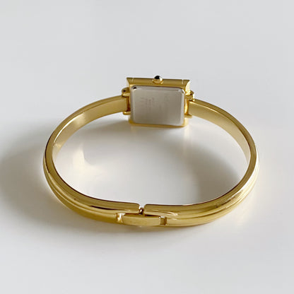 Yves Saint Laurent 1990s Gold Plated Bangle Watch
