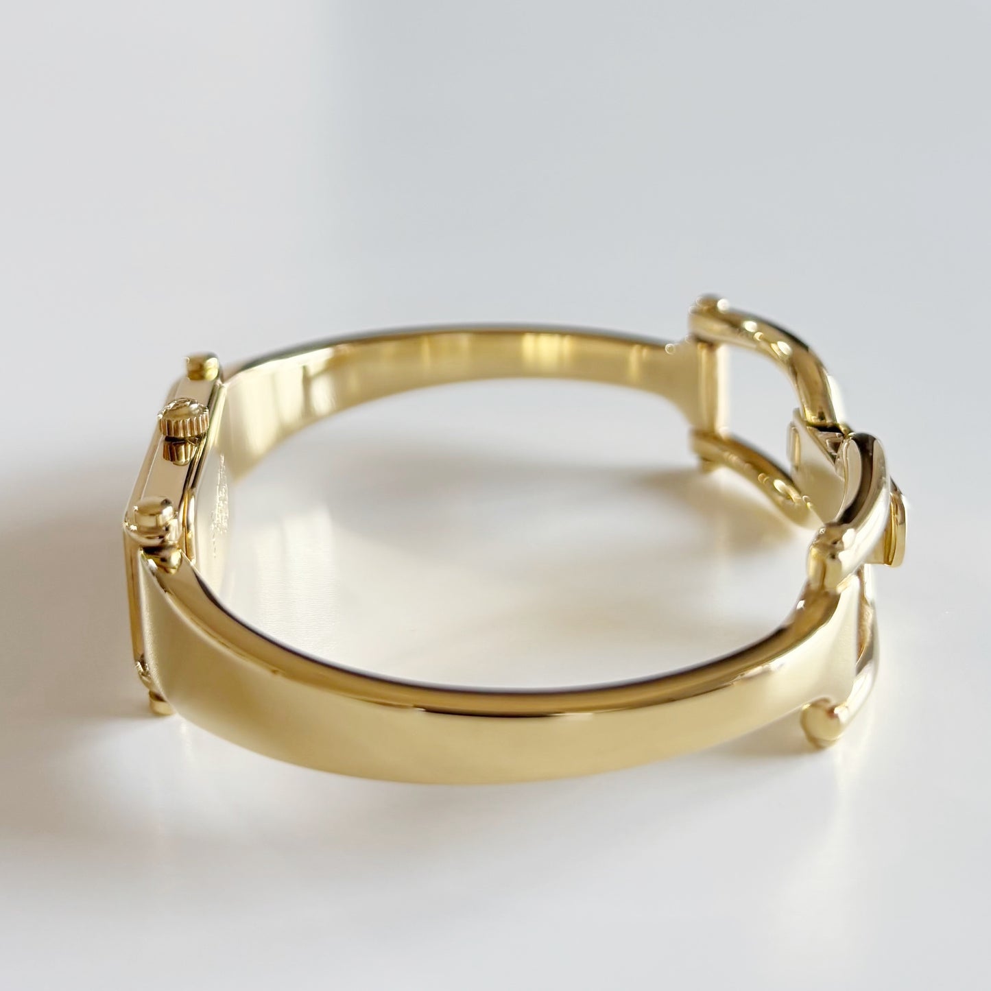 Gucci 1990s Cream Dial Rectangular Gold Plated Bangle Watch