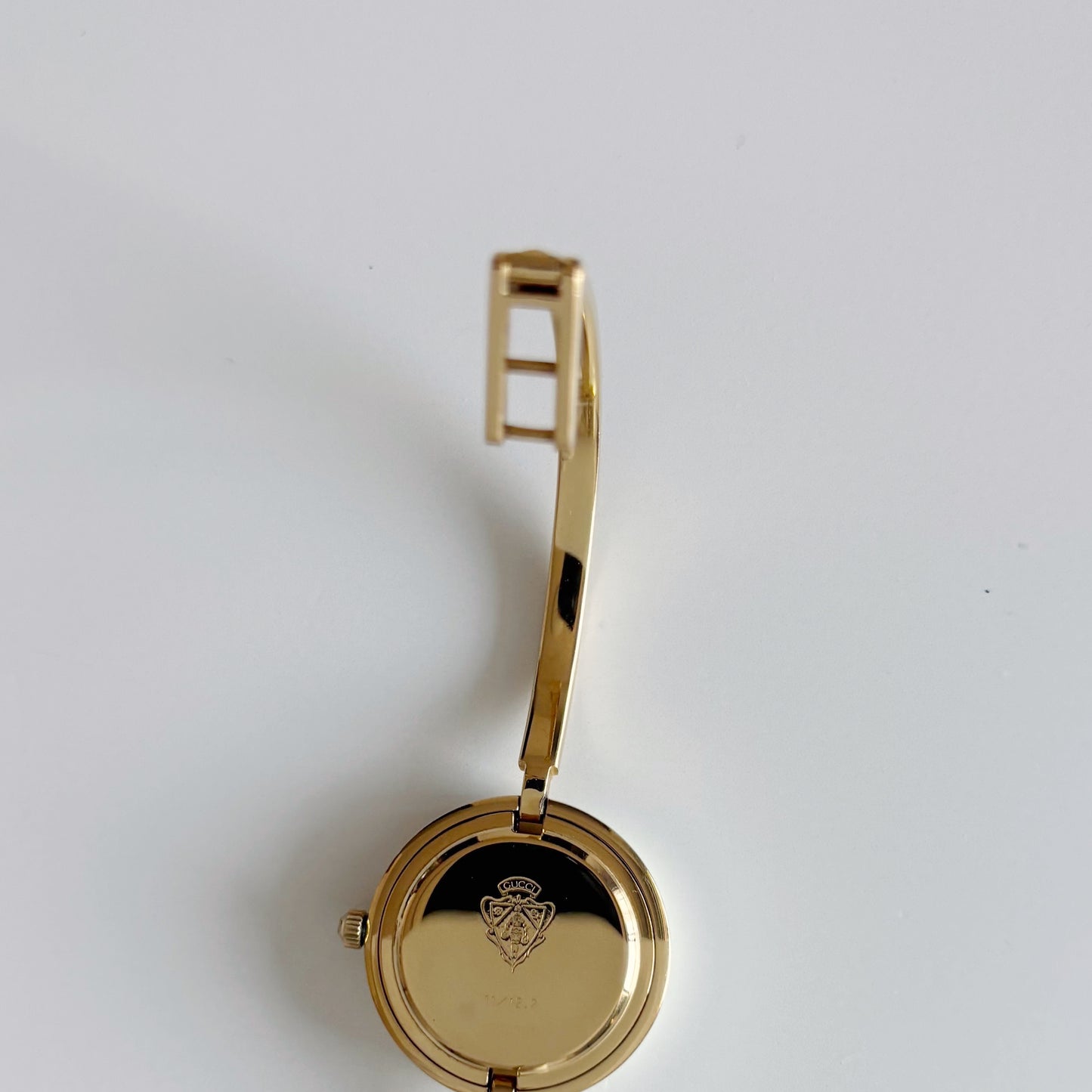 Gucci 1990s Interchangeable Bezel Gold Plated Bangle Watch with 12 bezels, case