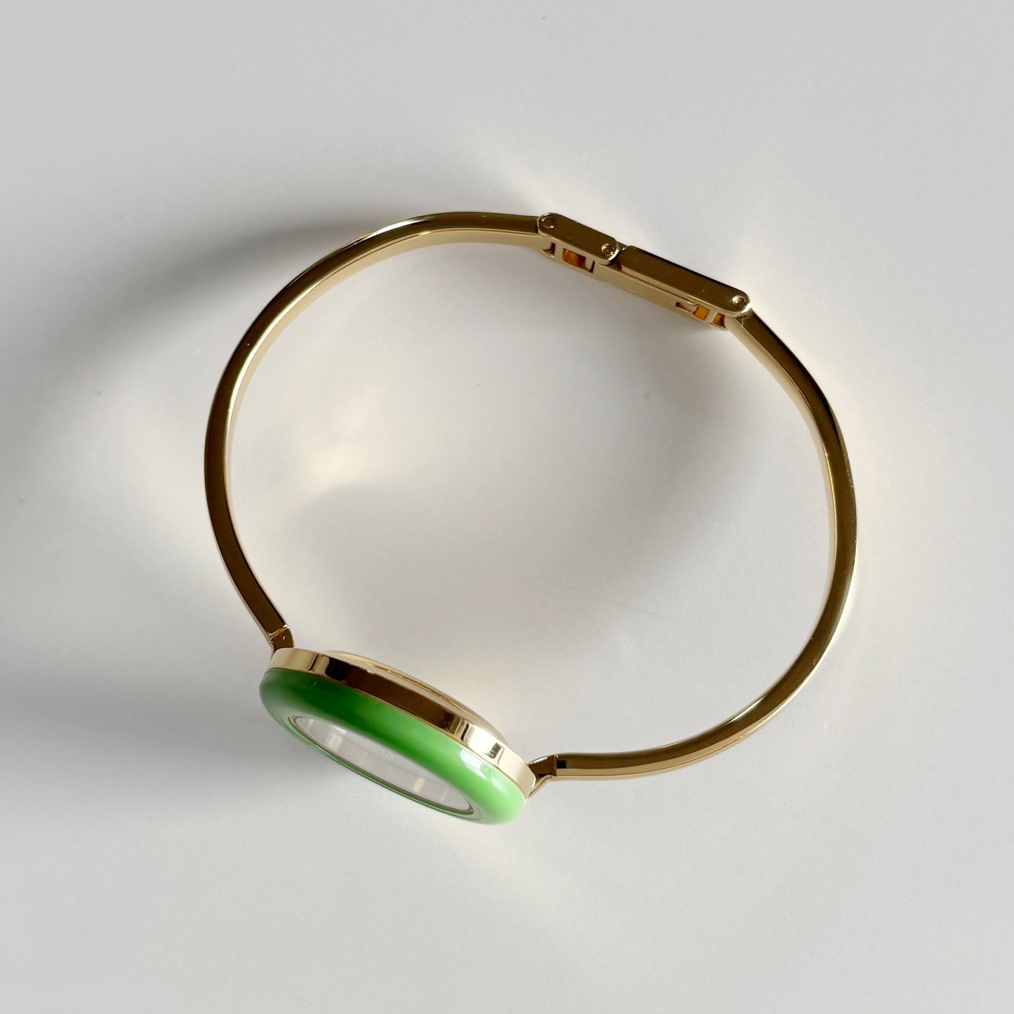 Gucci 1990s Interchangeable Bezel Gold Plated Bangle Watch with 12 bezels, case
