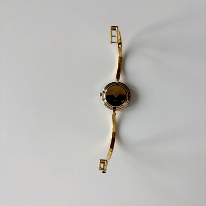 Gucci 1990s Interchangeable Bezel Gold Plated Bangle Watch with 12 bezels, case