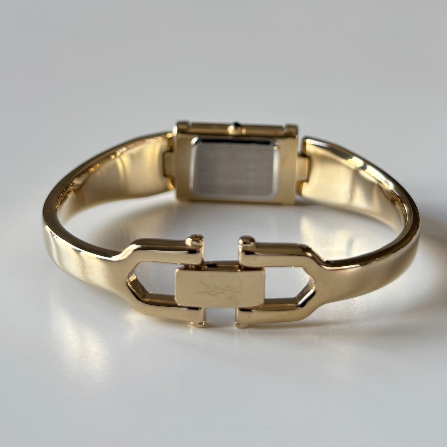 Yves Saint Laurent 1990s Peek-A-Boo Gold Plated Bangle Watch