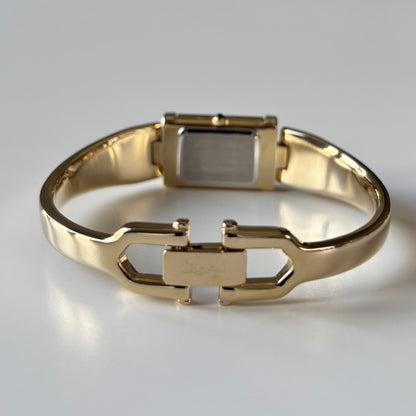 Yves Saint Laurent 1990s Peek-A-Boo Gold Plated Bangle Watch