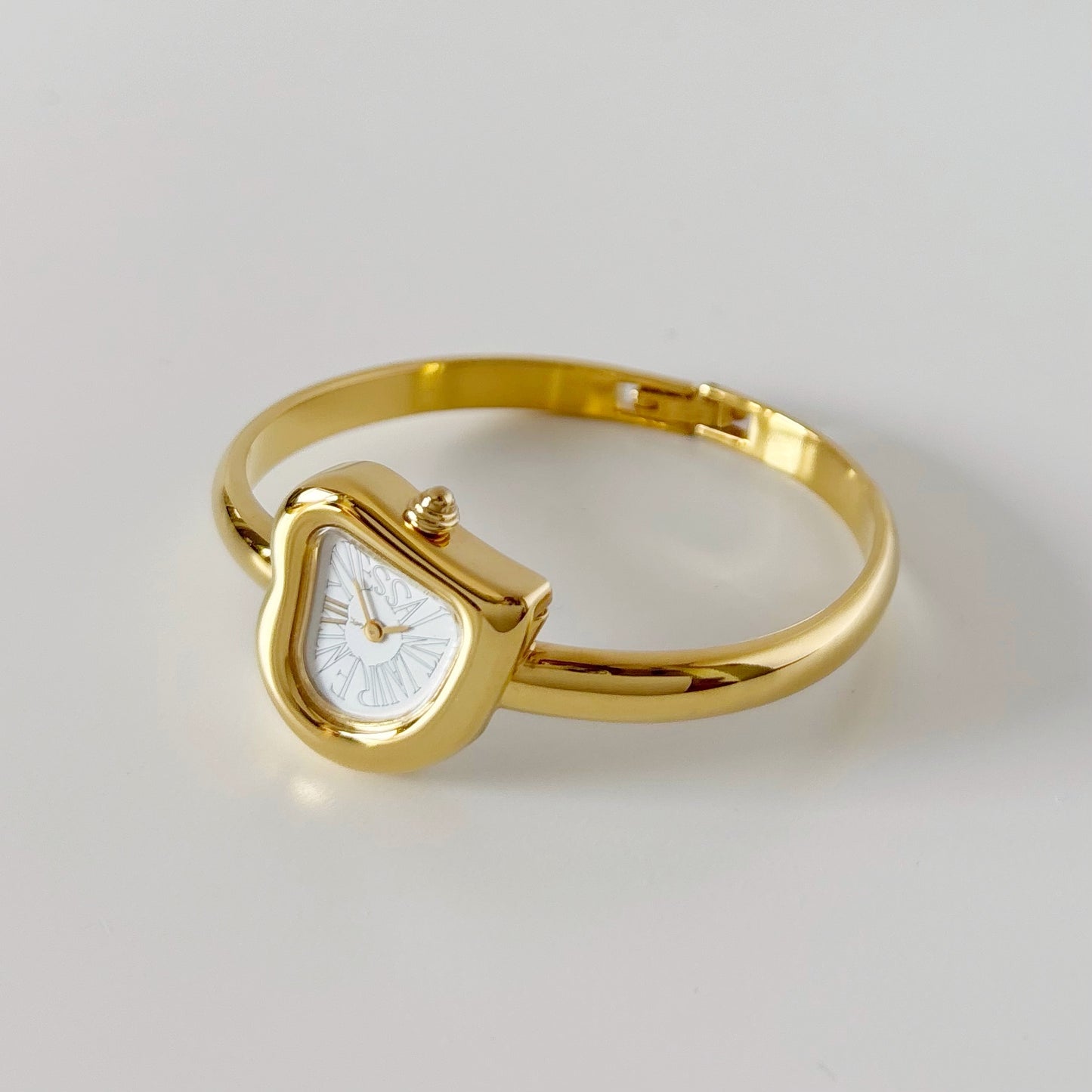 Yves Saint Laurent 1990s Heart Shaped Dial Gold Plated Bangle Watch