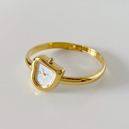 Yves Saint Laurent 1990s Heart Shaped Dial Gold Plated Bangle Watch