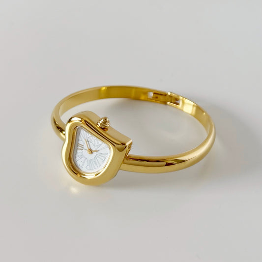 Yves Saint Laurent 1990s Heart Shaped Dial Gold Plated Bangle Watch