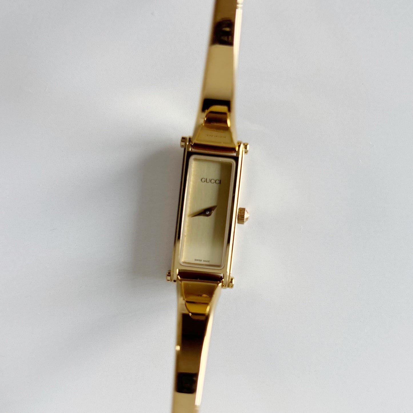 Gucci 1990s Gold Dial Rectangular Gold Plated Bangle Watch