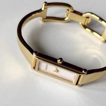 Gucci 1990s Seashell Rectangular Dial Gold Plated Bangle Watch