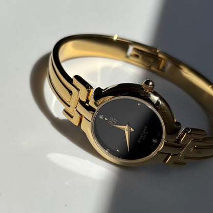 Givenchy 1990s Black Round Dial Gold Plated Bangle Watch