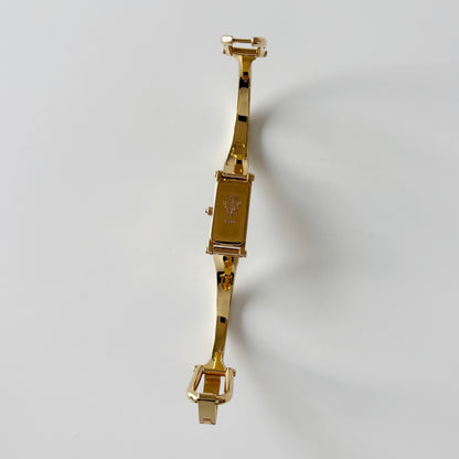 Gucci 1990s Rectangular Black Dial Gold Plated Bangle Watch