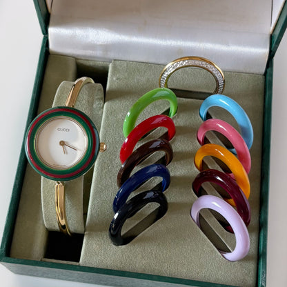 Gucci 1990s Interchangeable Bezel Gold Plated Bangle Watch with 12 bezels, case
