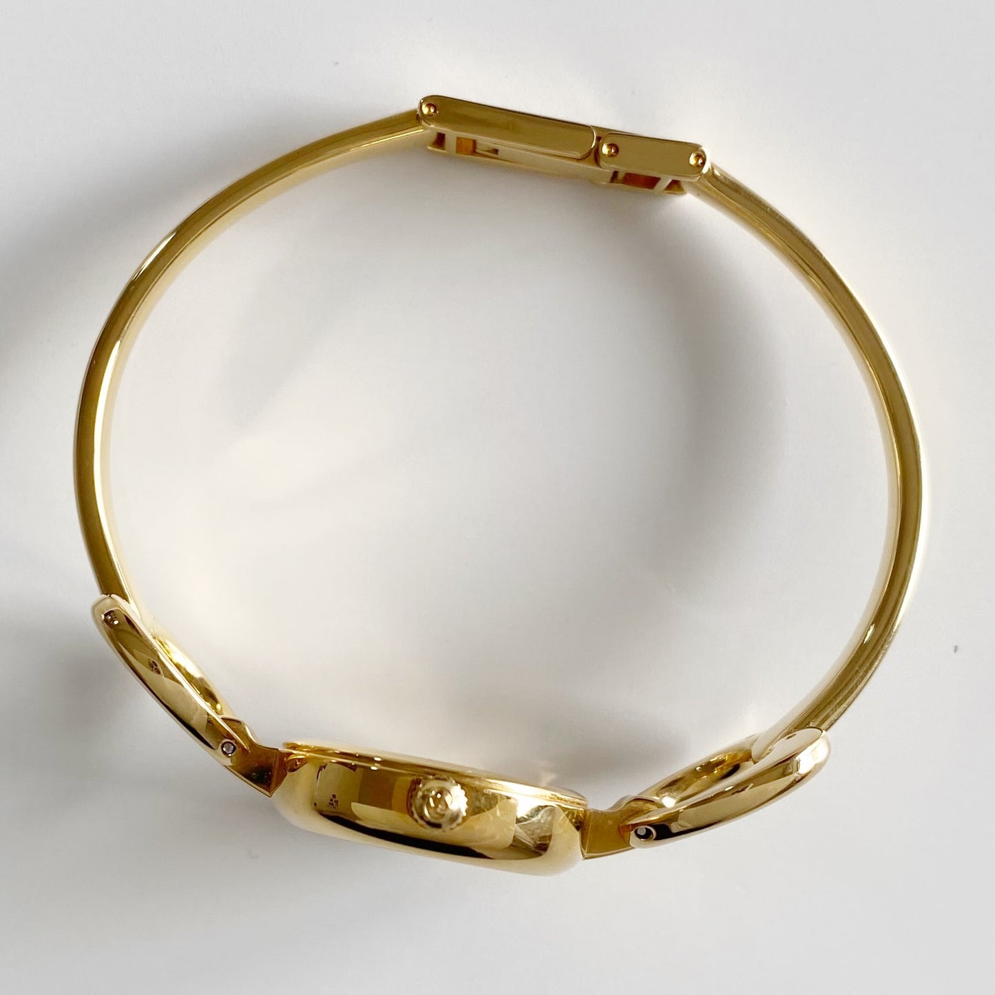Gucci 1990s Black Dial Gold Plated Bangle Watch
