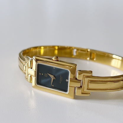 Givenchy 1990s Gold Plated Bangle Watch