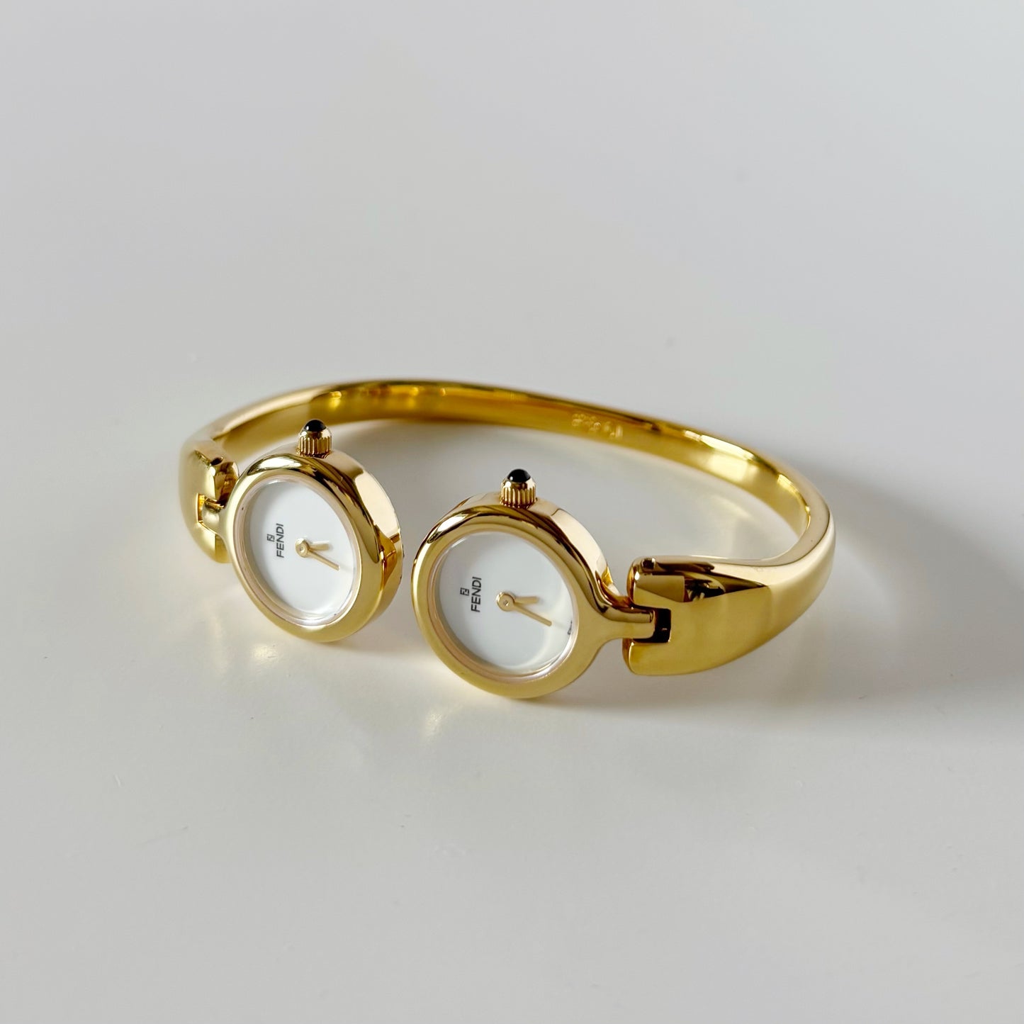 Fendi 1990s Seashell Dial Two Time Zone Gold Plated Bangle Watch