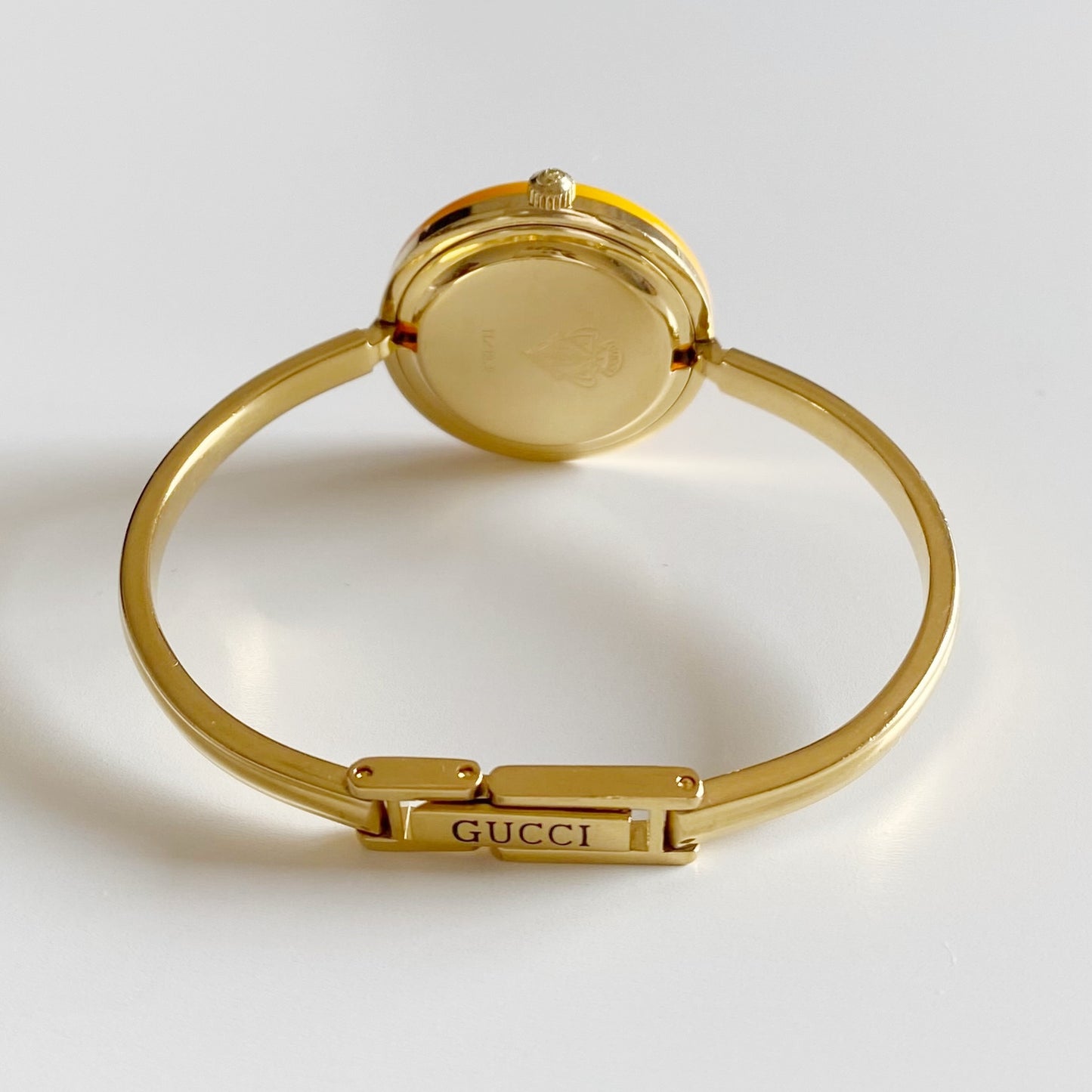 Gucci 1990s Interchangeable Bezel Gold Plated Bangle Watch with 12 bezels, case