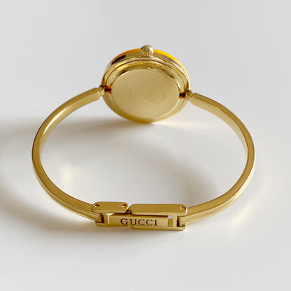 Gucci 1990s Interchangeable Bezel Gold Plated Bangle Watch with 12 bezels, case