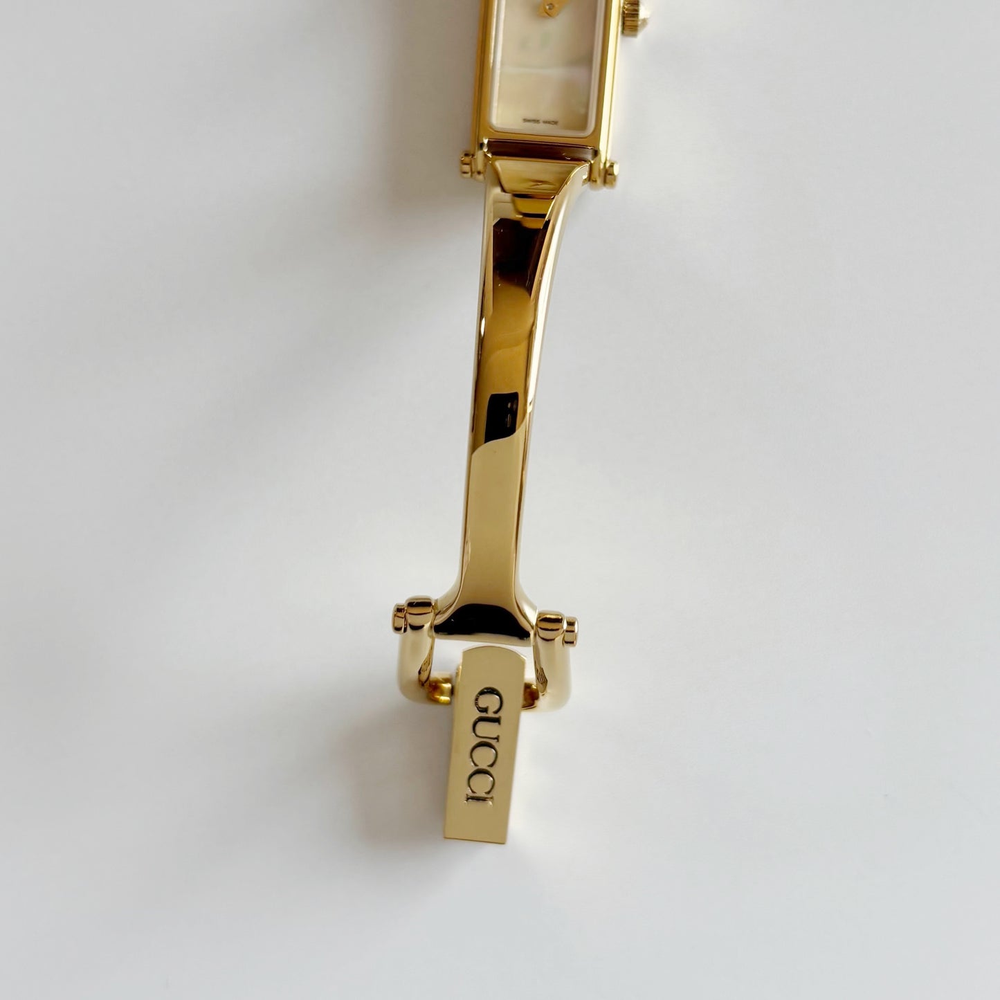 Gucci 1990s Seashell Rectangular Dial Gold Plated Bangle Watch