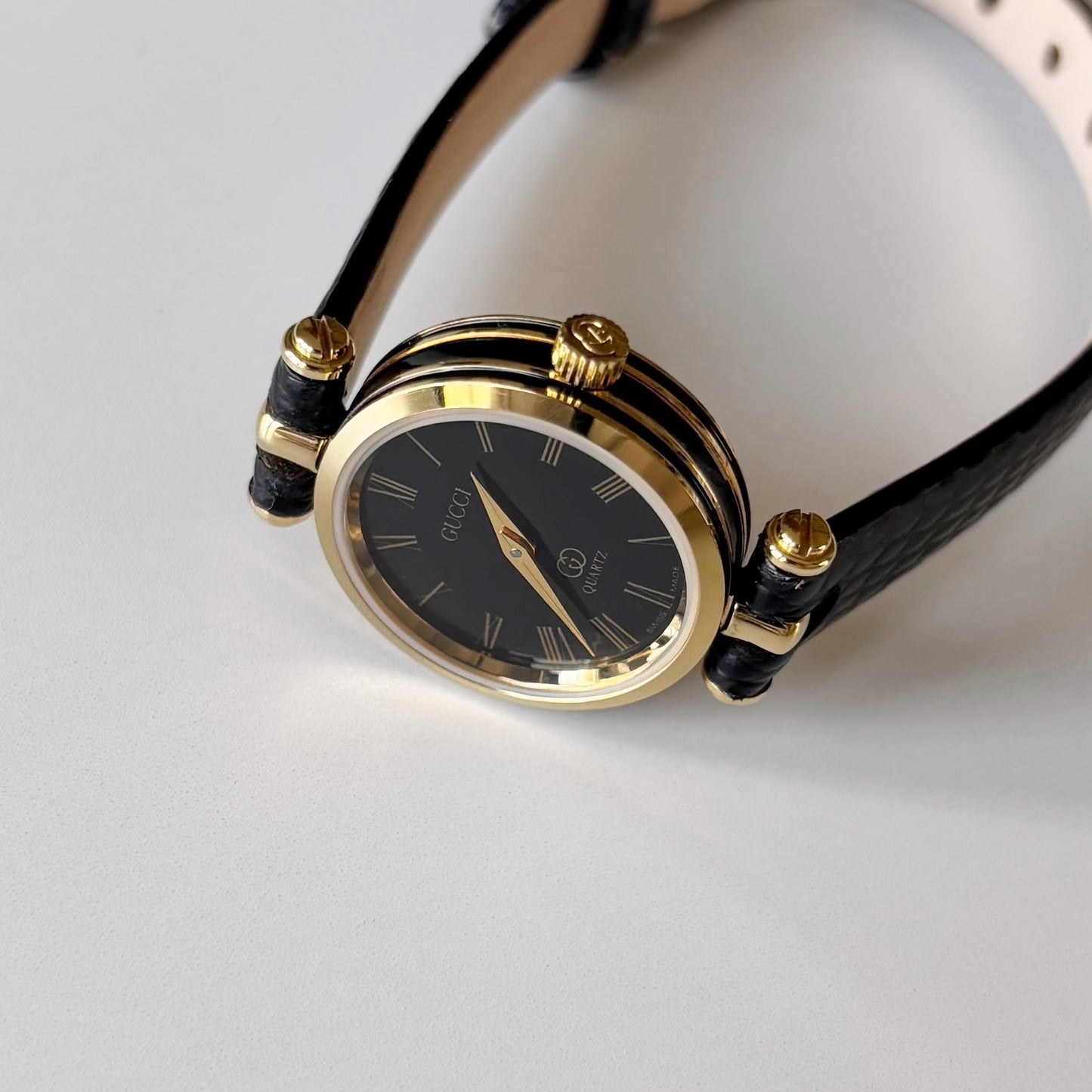 Gucci 1980s Black Round Dial Gold Plated Watch