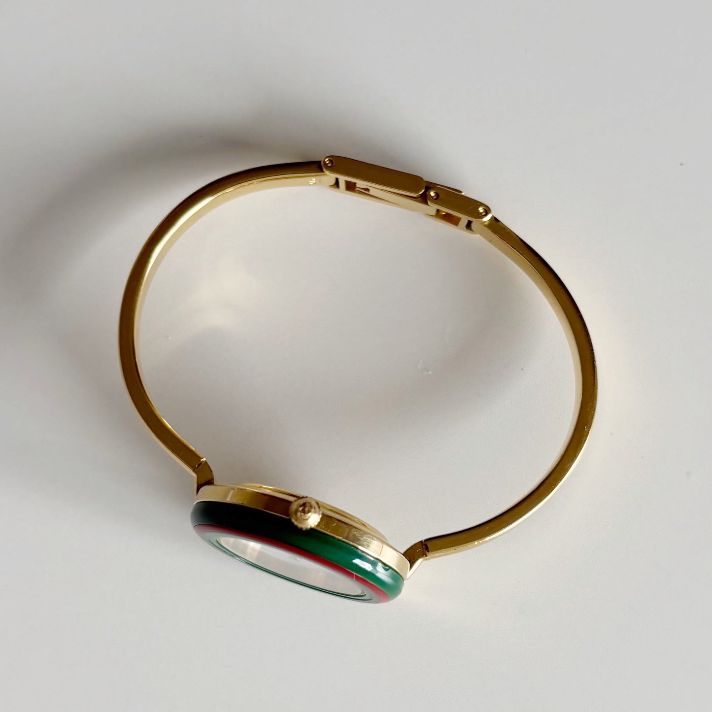 Gucci 1990s Interchangeable Bezel Gold Plated Bangle Watch with 12 bezels, case (Small)