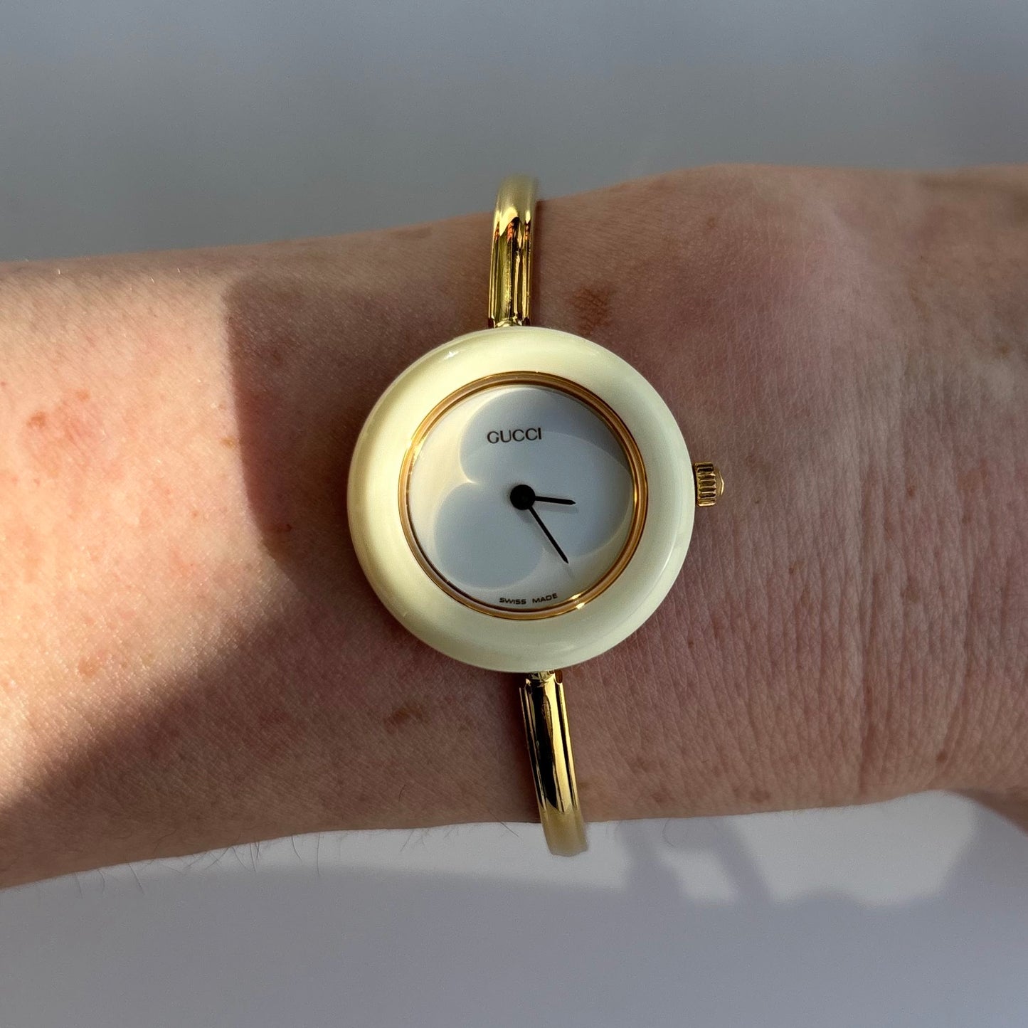 Gucci 1990s Interchangeable Bezel Gold Plated Bangle Watch with 12 bezels, case