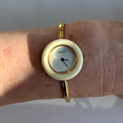 Gucci 1990s Interchangeable Bezel Gold Plated Bangle Watch with 12 bezels, case