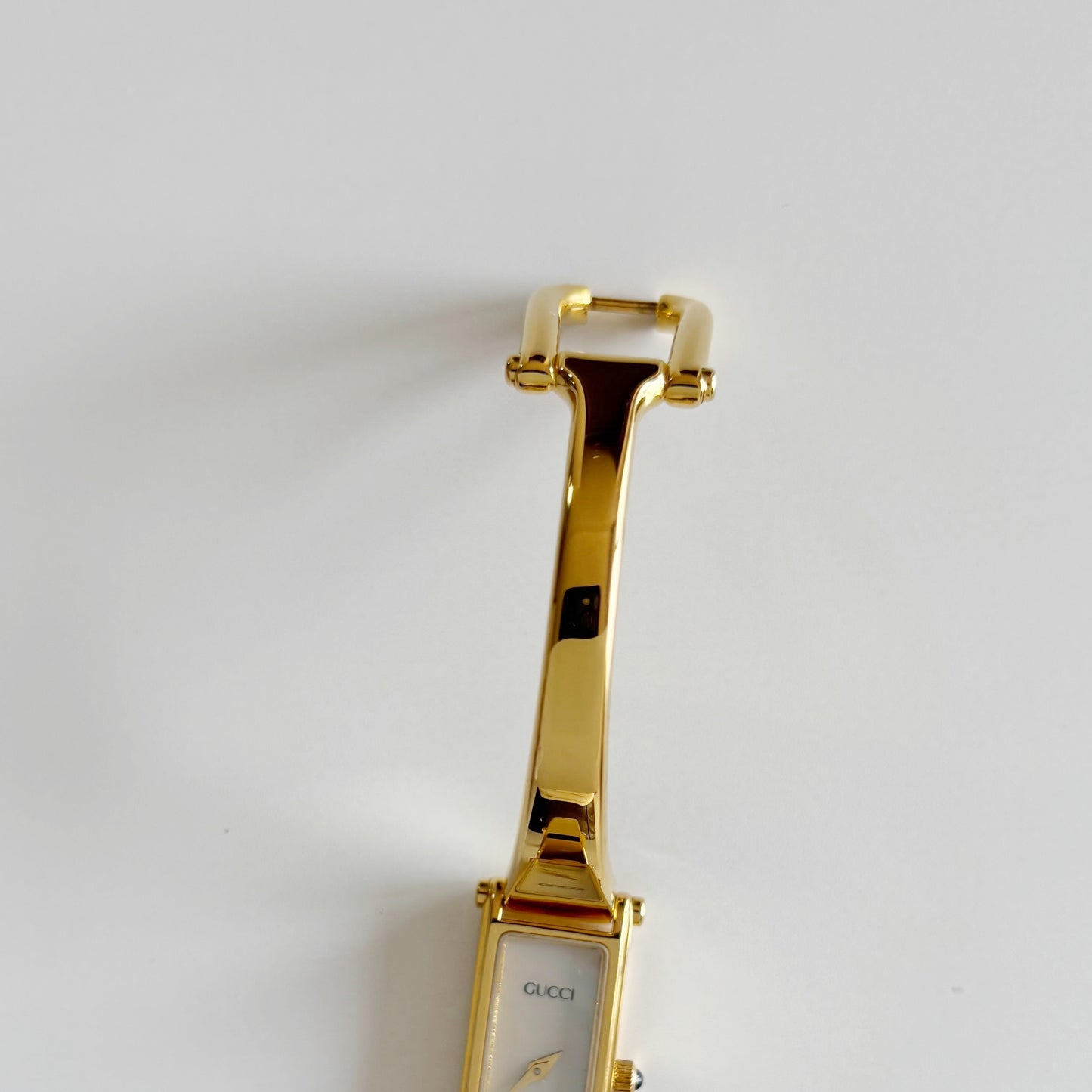 Gucci 1990s Seashell Dial Rectangular Gold Plated Bangle Watch