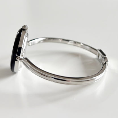 Gucci 1990s Interchangeable Bezel Stainless steel Bangle Watch with 12 bezels, case