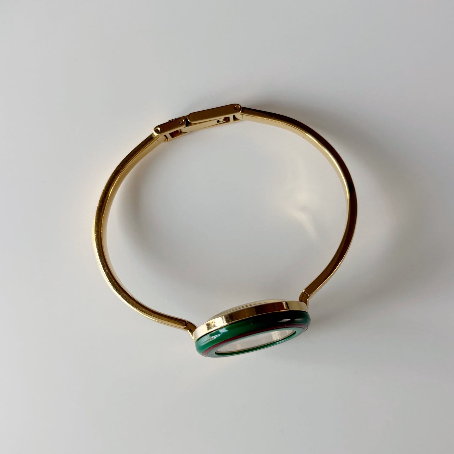 Gucci 1990s Interchangeable Bezel Gold Plated Bangle Watch with 12 bezels, case
