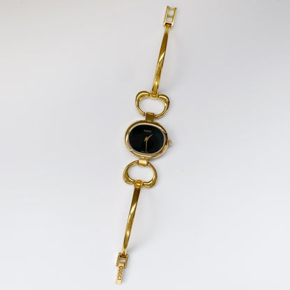 Gucci 1990s Black Dial Gold Plated Bangle Watch