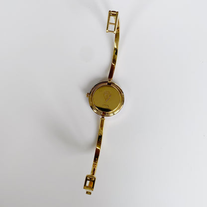 Gucci 1990s Interchangeable Bezel Gold Plated Bangle Watch with 12 bezels, case