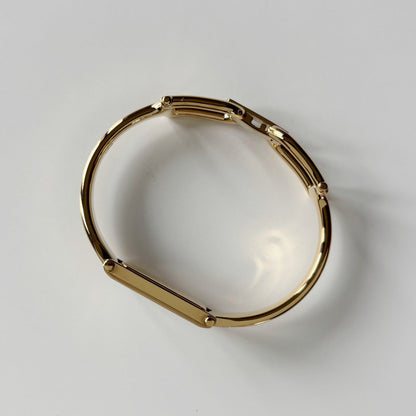 Gucci 1990s Seashell Rectangular Dial Gold Plated Bangle Watch
