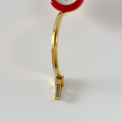 Gucci 1990s Interchangeable Bezel Gold Plated Bangle Watch with 12 bezels, case