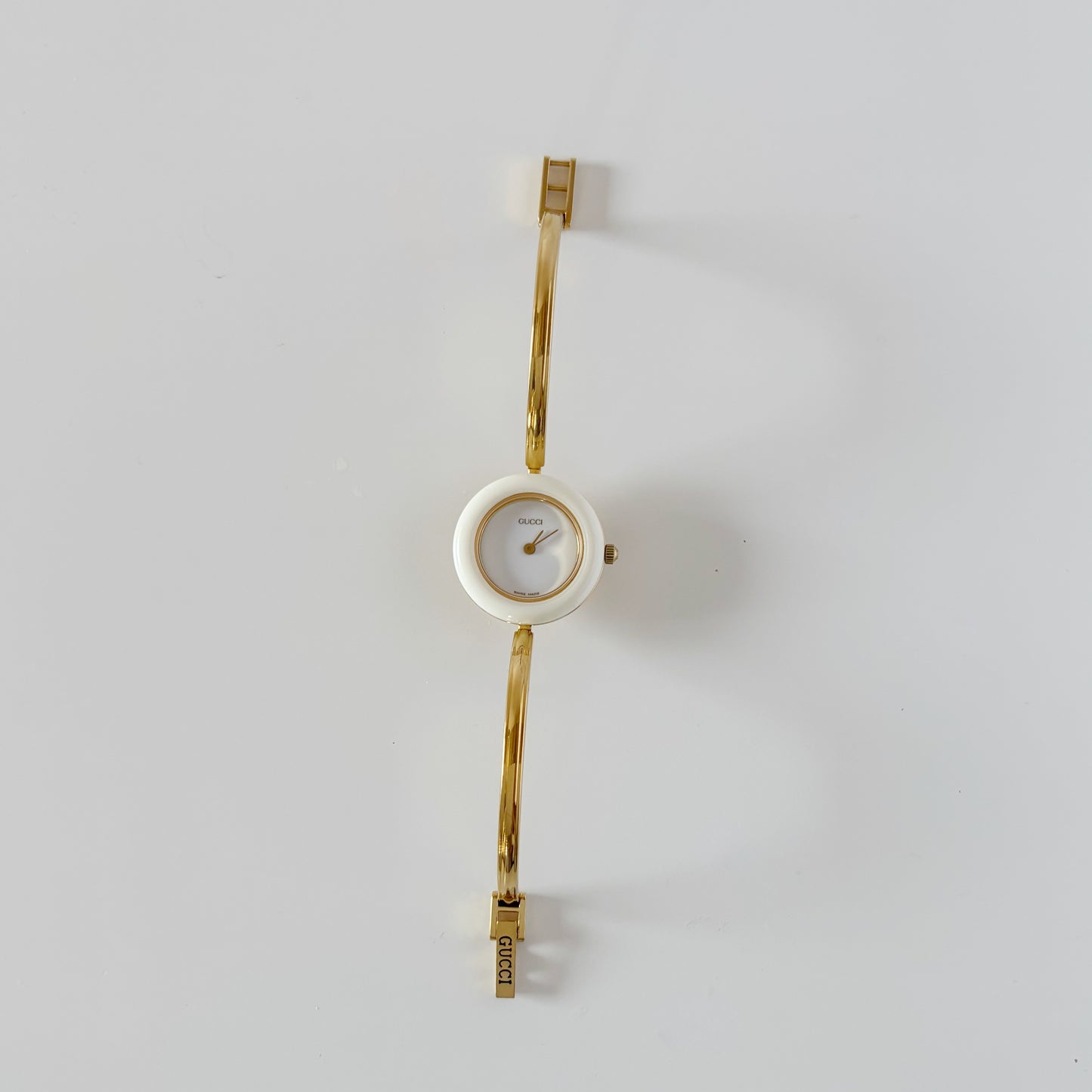 Gucci 1990s Interchangeable Bezel Gold Plated Bangle Watch with 12 bezels, case