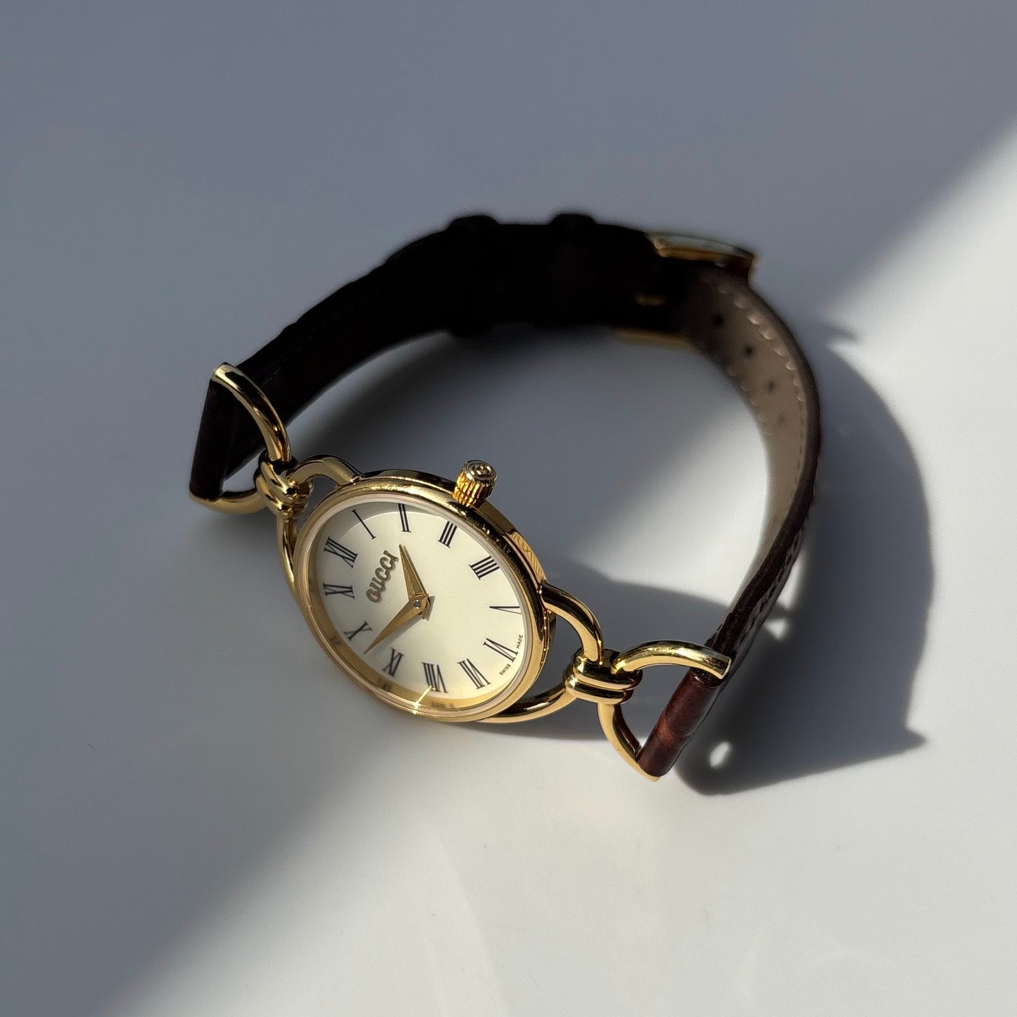 Gucci 1990s Round Dial Gold Plated Horsebit Watch