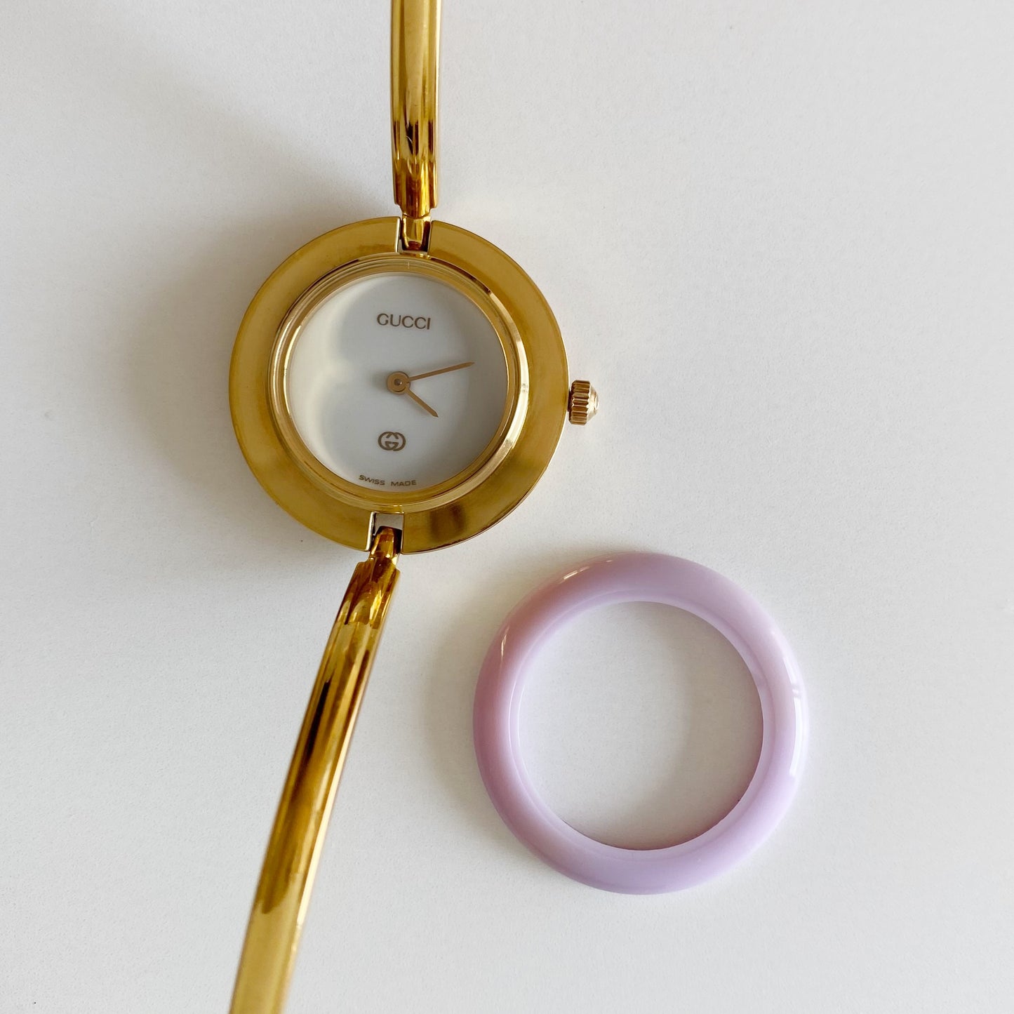 Gucci 1990s Interchangeable Bezel Gold Plated Bangle Watch with 12 bezels, case