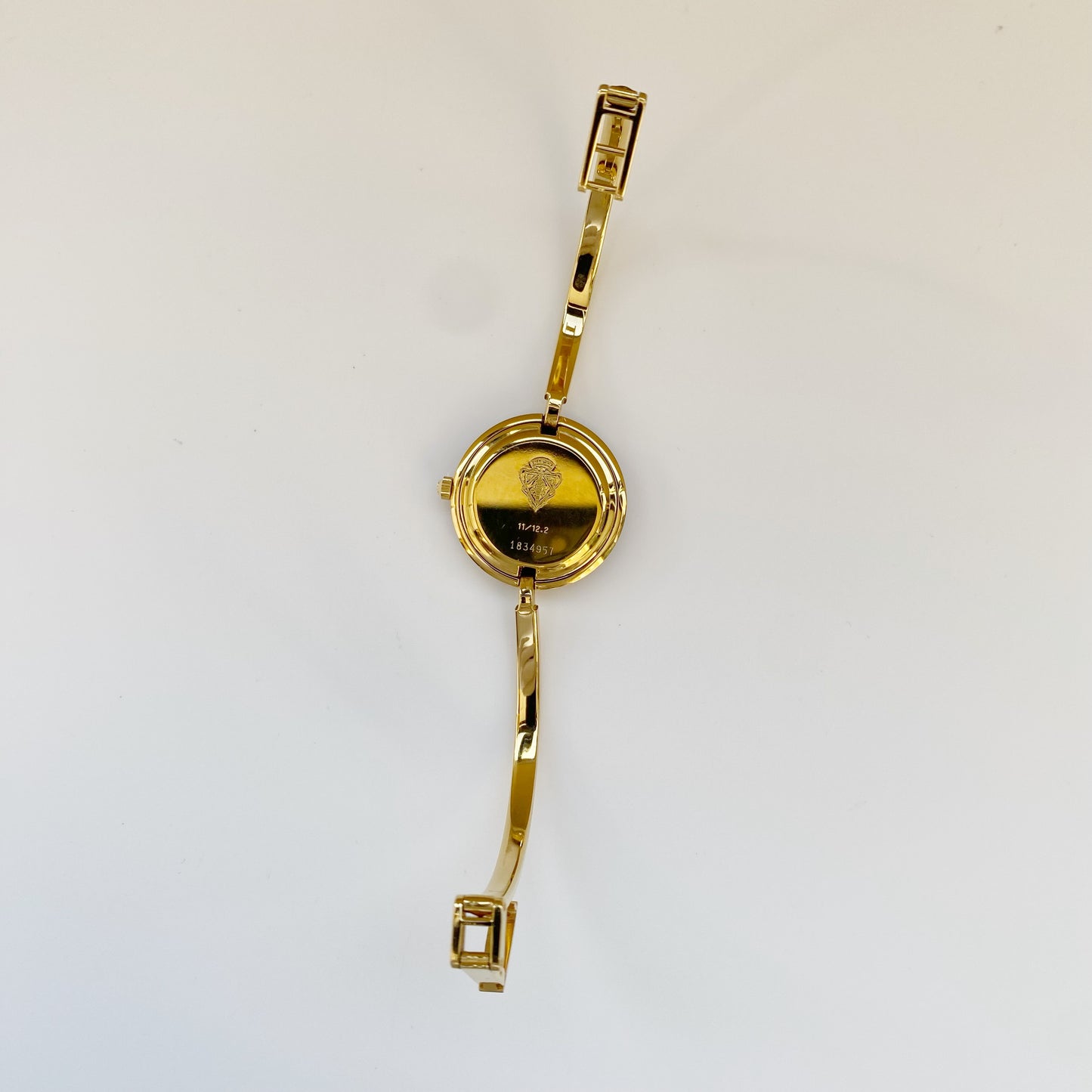 Gucci 1990s Interchangeable Bezel Gold Plated Bangle Watch with 12 bezels, case