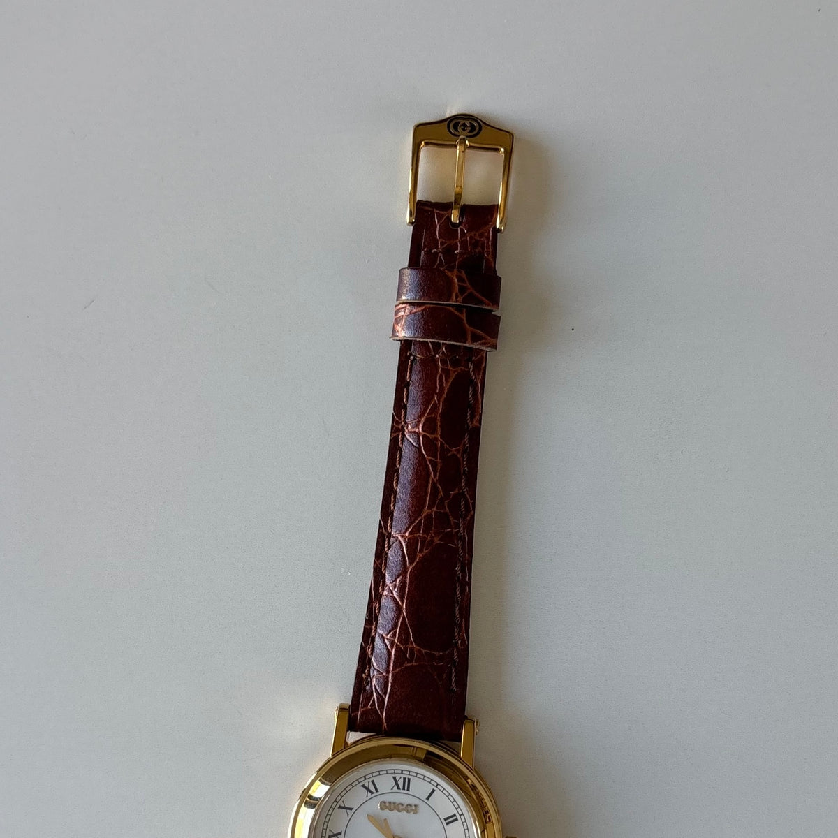 Gucci 1990s Date Round Dial Gold-Plated Watch
