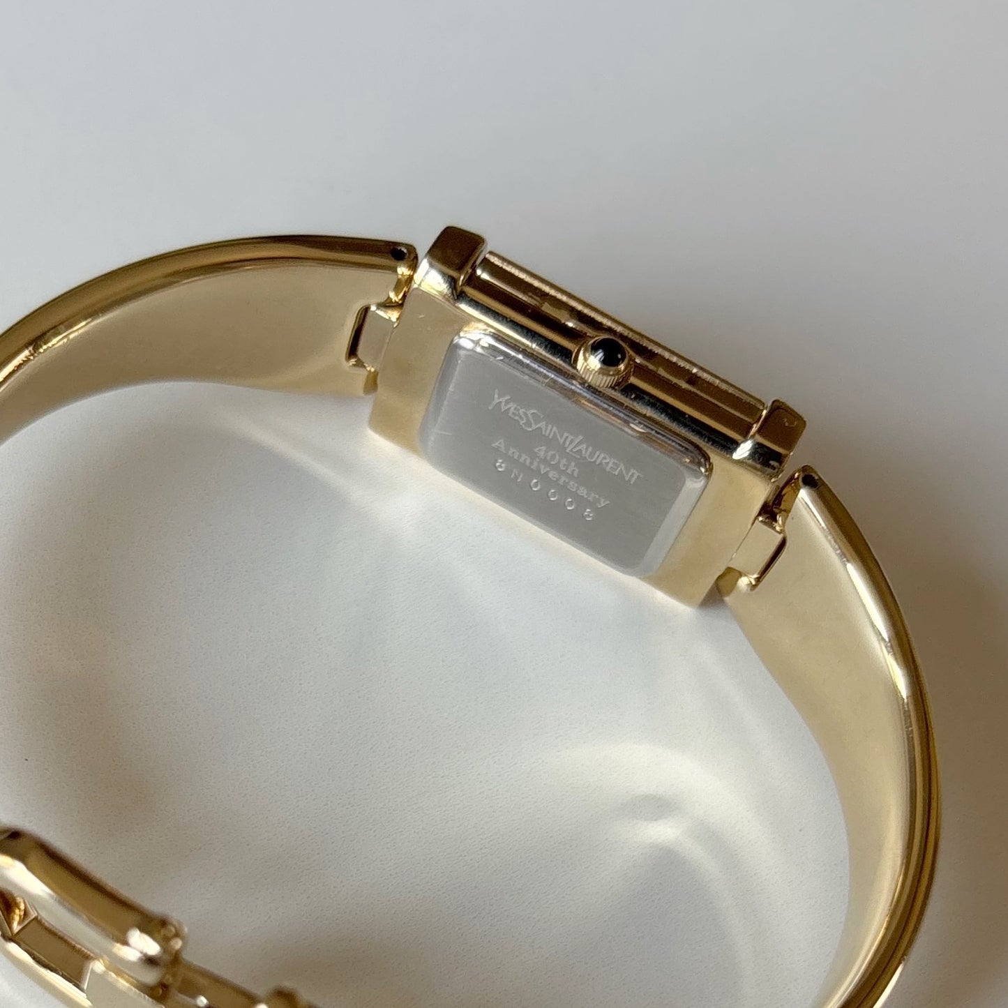 Yves Saint Laurent 1990s Peek a boo Gold Plated Bangle Watch