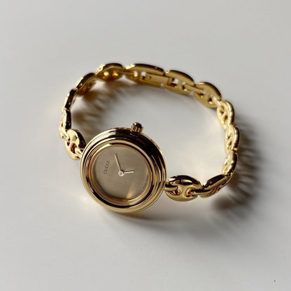 Gucci 1990s Interchangeable Bezel Gold Plated Rice Chain Watch with 6 bezels, case (170mm)