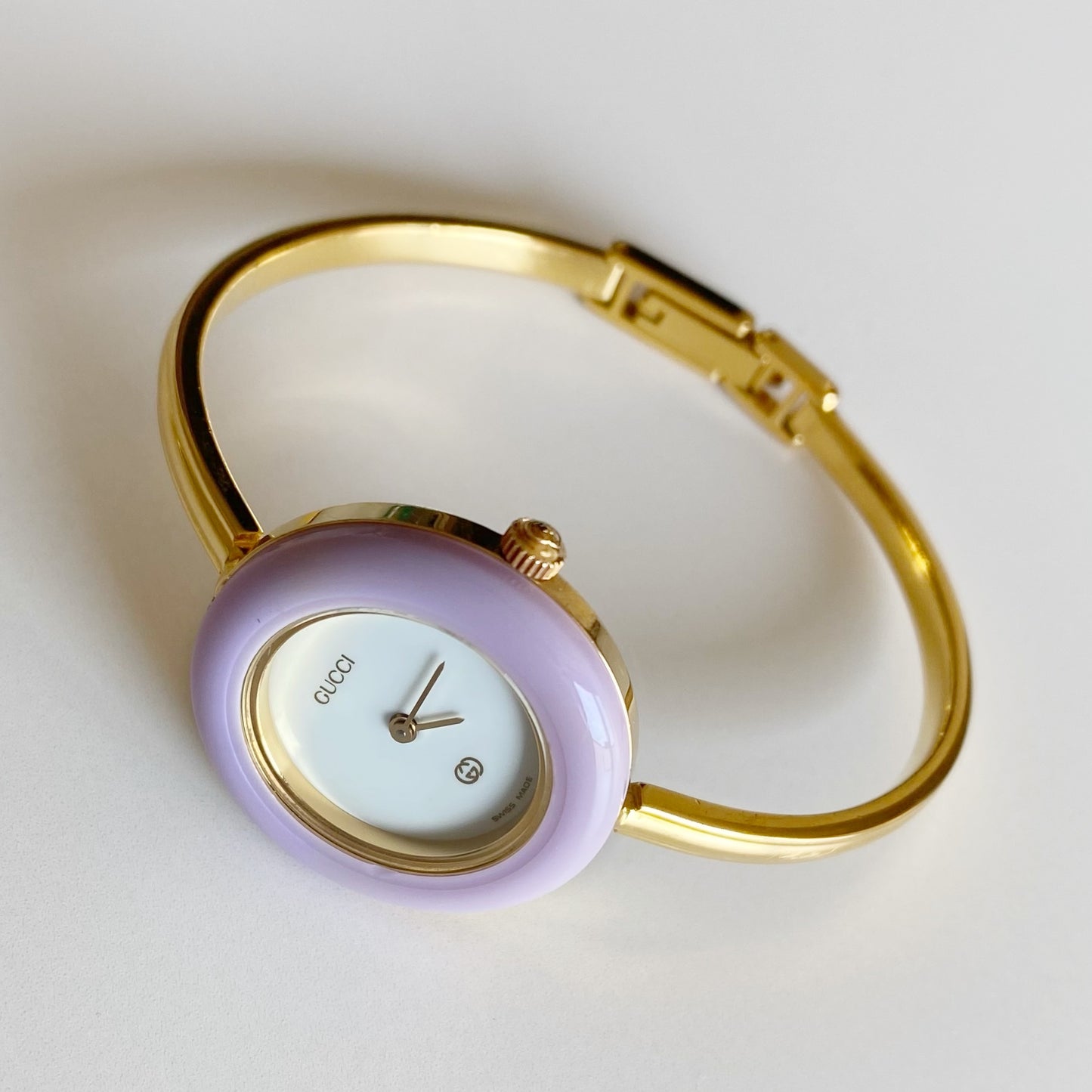 Gucci 1990s Interchangeable Bezel Gold Plated Bangle Watch with 12 bezels, case