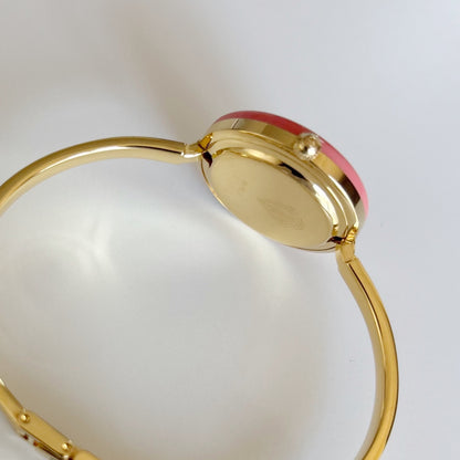 Gucci 1990s Interchangeable Bezel Gold Plated Bangle Watch with 12 bezels, case