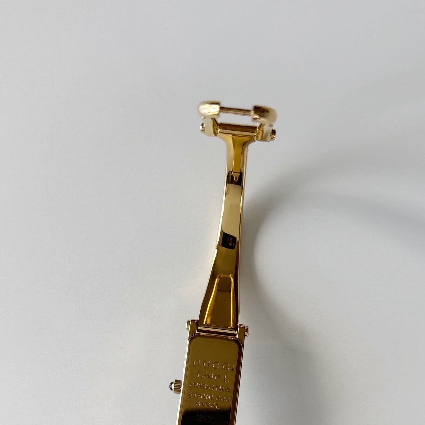 Gucci 1990s Black Rectangular Dial Gold Plated Bangle Watch