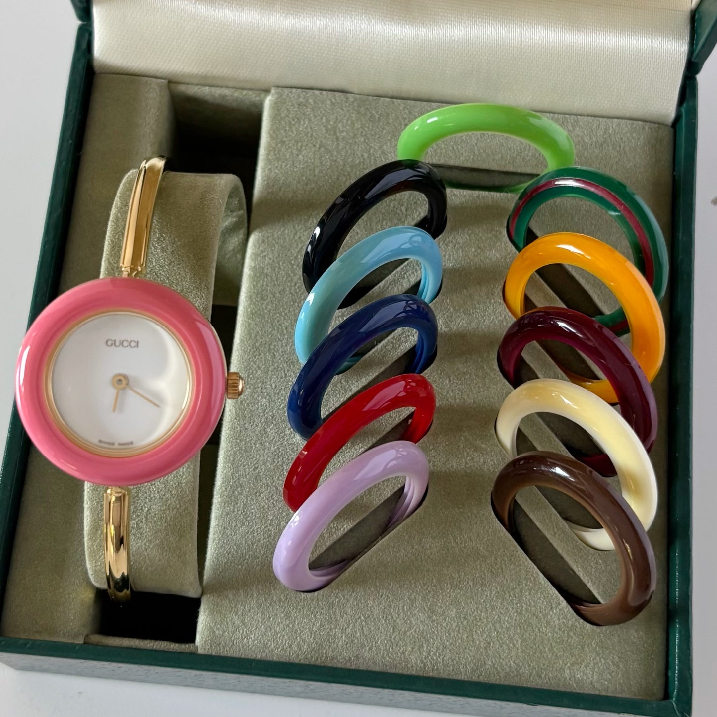 Gucci 1990s Interchangeable Bezel Gold Plated Bangle Watch with 12 bezels, case