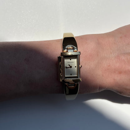 Yves Saint Laurent 1990s Peek a boo Gold Plated Bangle Watch