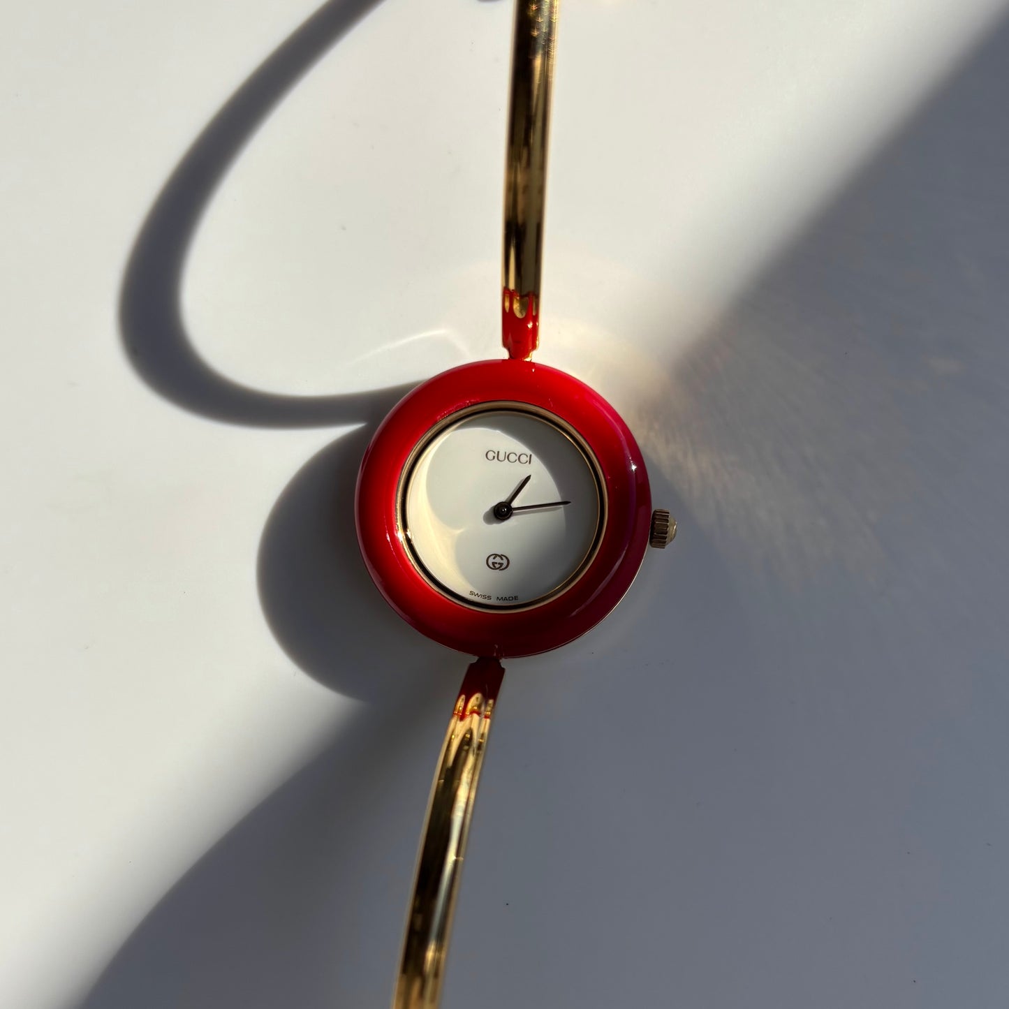 Gucci 1990s Interchangeable Bezel Gold Plated Bangle Watch with 12 bezels, case